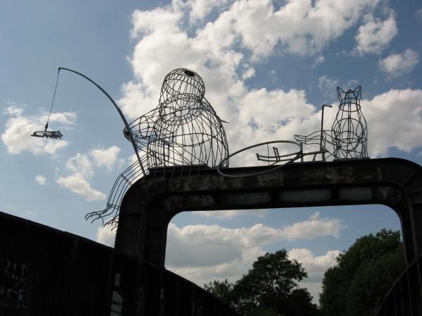 The fisher of dreams sculpture on Naburn rail bridge